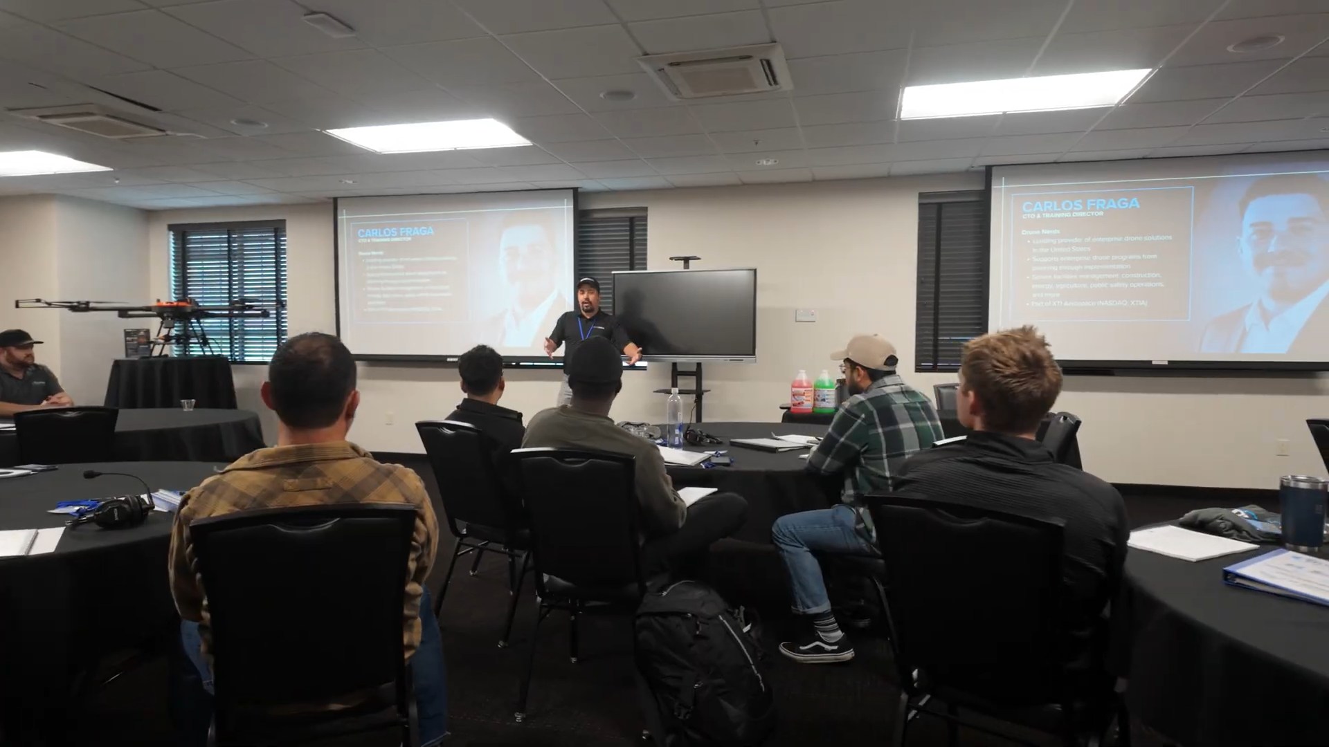 Commercial drone cleaning training in progress with a live operation demonstration